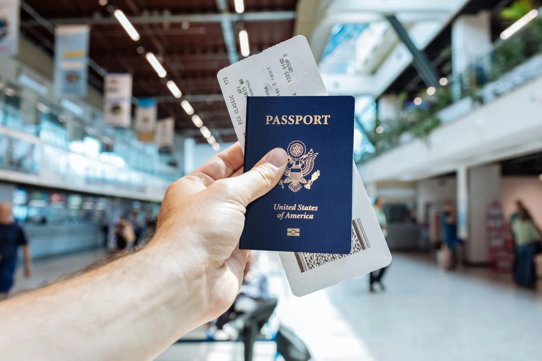 US passport held in an airport
